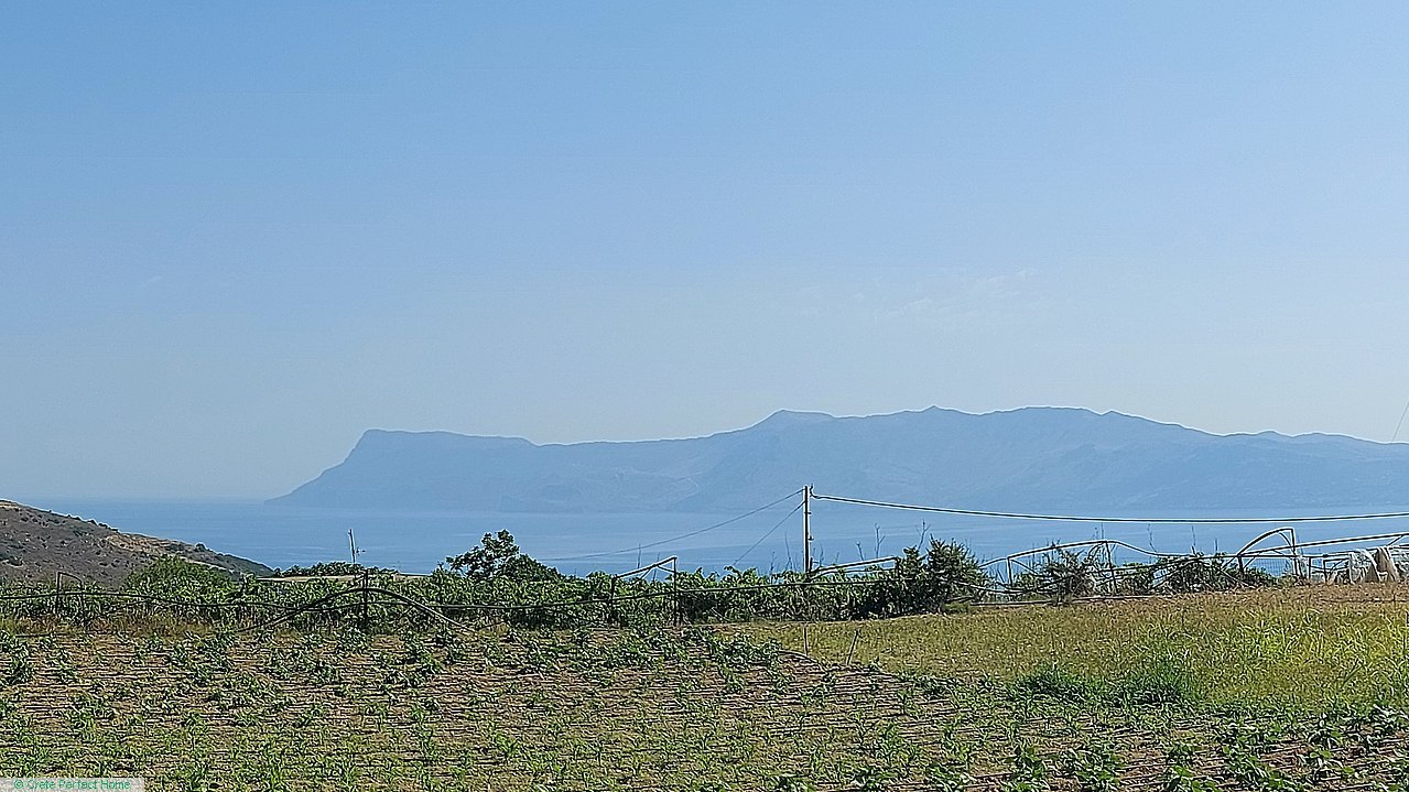 Large level plot above village, close to beaches, sea & rural views, large build allowance