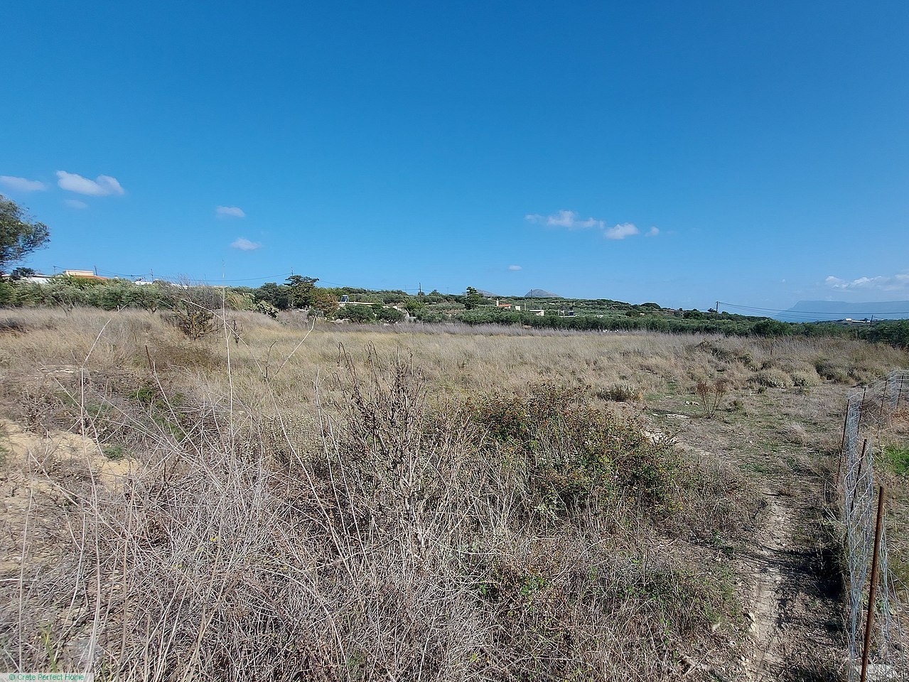 Small plot in village limits, distant sea view, close to famous Falassarna beach