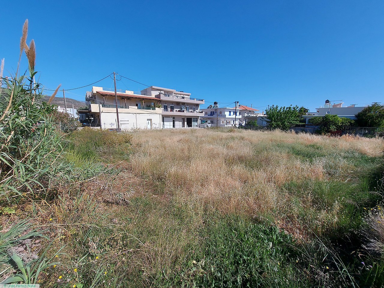 Large plot in town plan, close to beaches, huge build allowance, roads on 3 sides