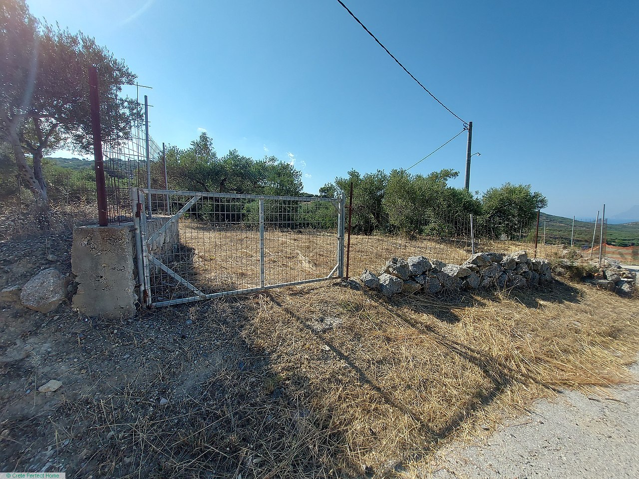 Level plot in quiet elevated village, good build allowance, sea & rural views